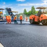 Construction,Site,Is,Laying,New,Asphalt,Road,Pavement,road,Construction,Workers